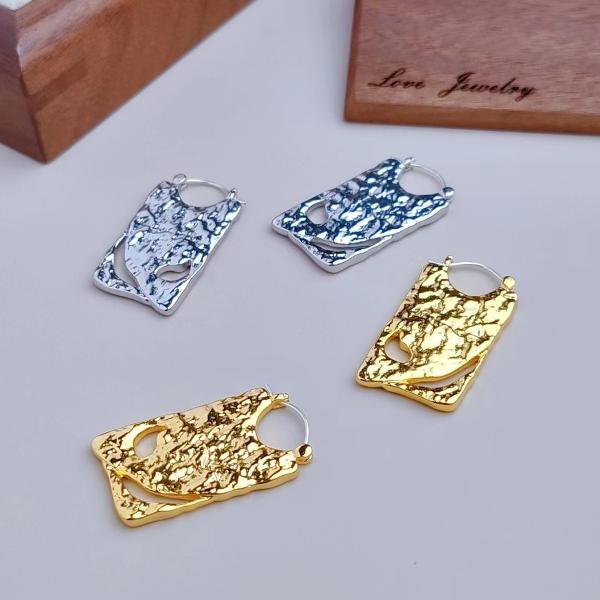 Einzigartige Board-Ohrringe – Gold und Silber