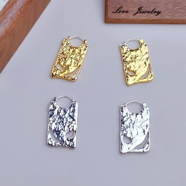 Einzigartige Board-Ohrringe – Gold und Silber