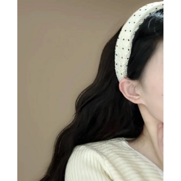 Elegantes gepunktetes Stirnband