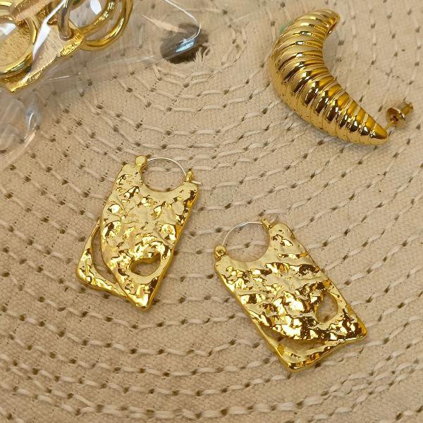 Einzigartige Board-Ohrringe – Gold und Silber