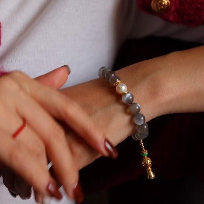 Labradorit -Armband mit Buddhismus glücklicher Reize
