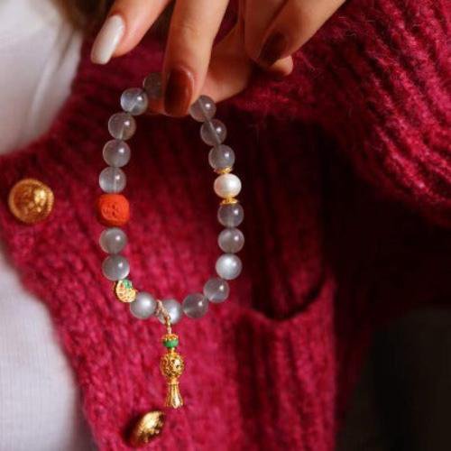 Labradorit -Armband mit Buddhismus glücklicher Reize