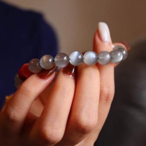 Labradorit -Armband mit Buddhismus glücklicher Reize